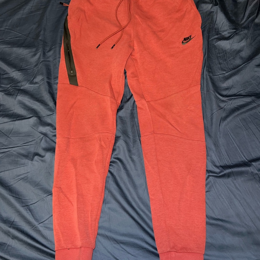 Nike Red Sweatpants with Tapered Leg Design
